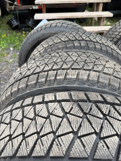 4 pneus d hiver 235/55r19 Bridgestone a l état neuf
