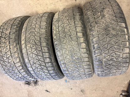 4 pneus d hiver 255/50r20 Bridgestone en bon etat