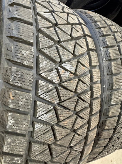 4 pneus d hiver 235/45r19 Bridgestone a l état neuf