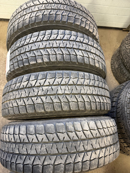 4 pneus d hiver 225/65r17 Bridgestone en bon état