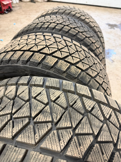 4 pneus d hiver 275/45r20 Bridgestone a l etat neuf