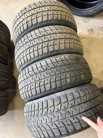 4 pneus d hiver 215/50r17 Bridgestone en bon etat