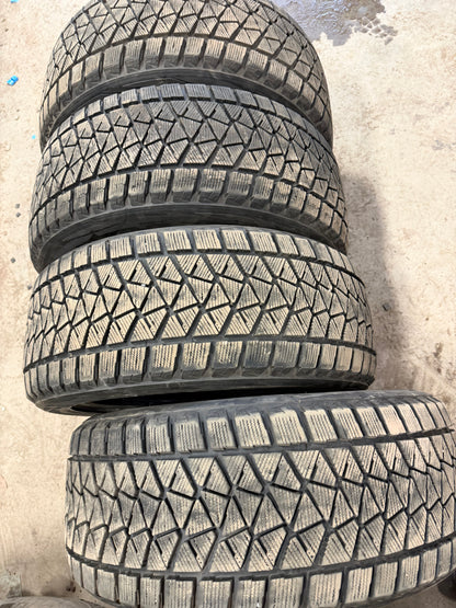4 pneus d hiver 275/45r20 Bridgestone a l etat neuf