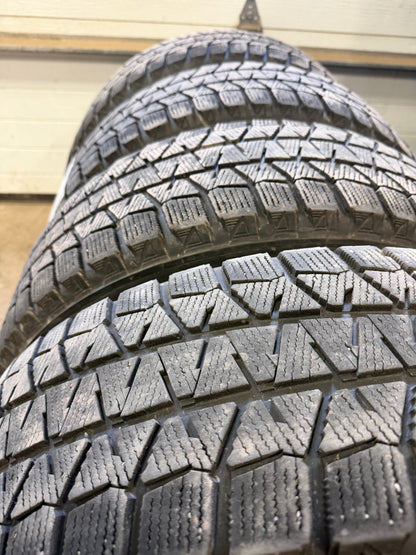 4 pneus d hiver 225/65r17 Bridgestone en bon état