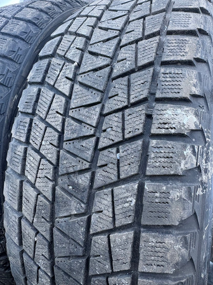 2 pneus d hiver 245/55r19 bridgestone en bon état